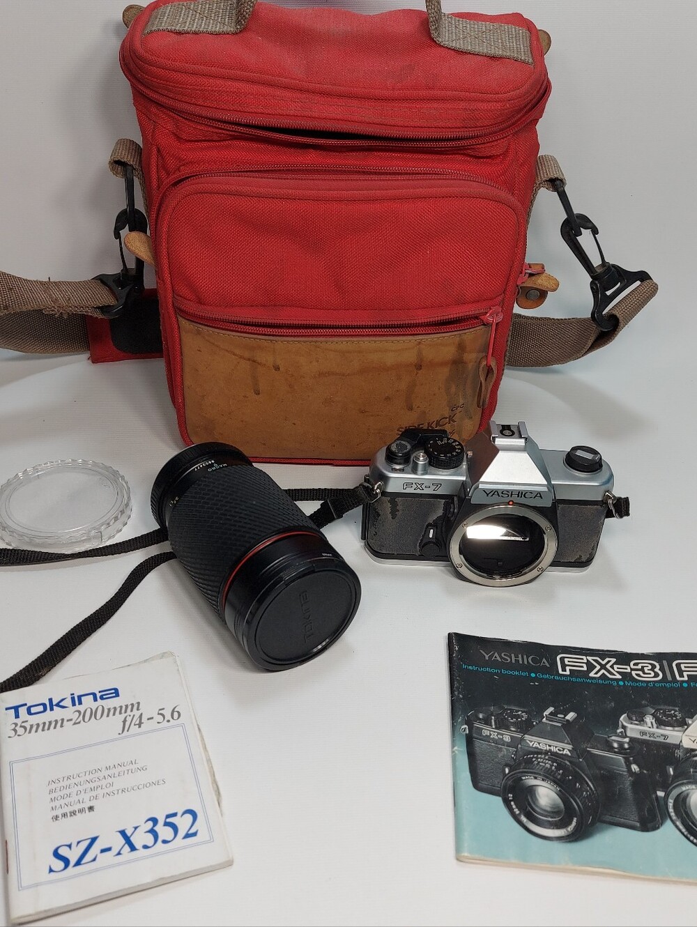 Yashica FX-7 35mm with Tokina SD 35-200mm f:1.4-5.6 Lens, Bag Manuals